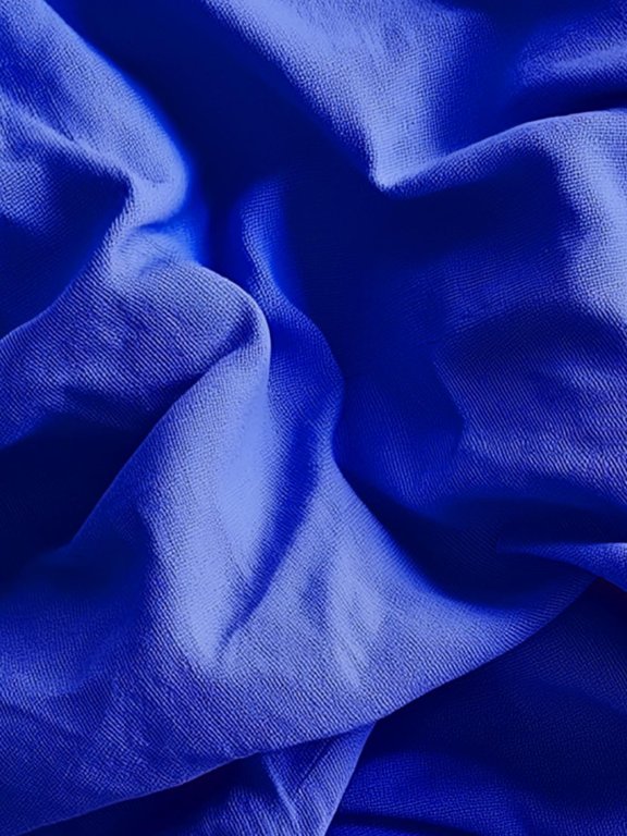 Image of crumpled blue textile ready for recycling