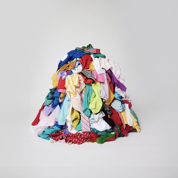 A pile of clothing to be recycled by Reju